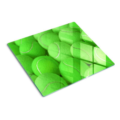 tennisballen-op-een-groene-achtergrond